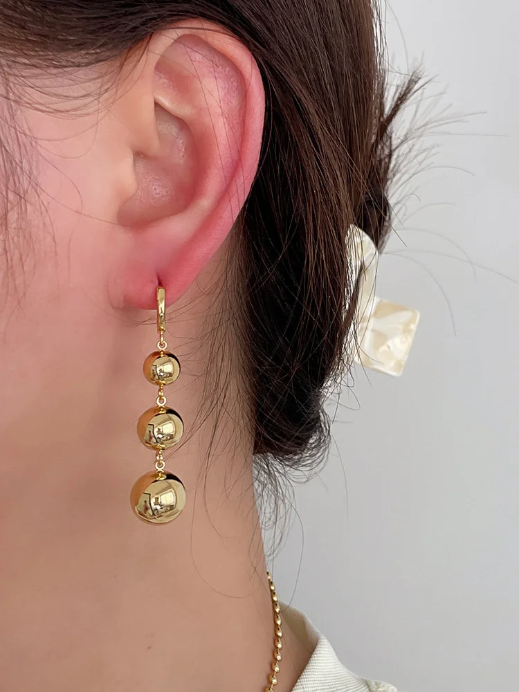 

Kshmir Design metallic gold ball earrings with long fringed earrings for women to go with fashionable earrings and jewelry gifts