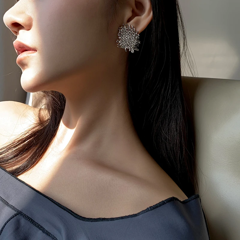 

Original designer retro metal woven earrings