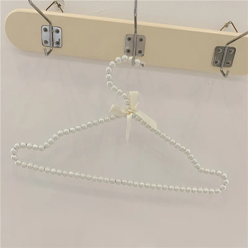 

Glittering Powder Transparent Plastic Skirt Clothes Rack Pearl Girl Heart Clothes Rack Cloakroom Clothes Rack