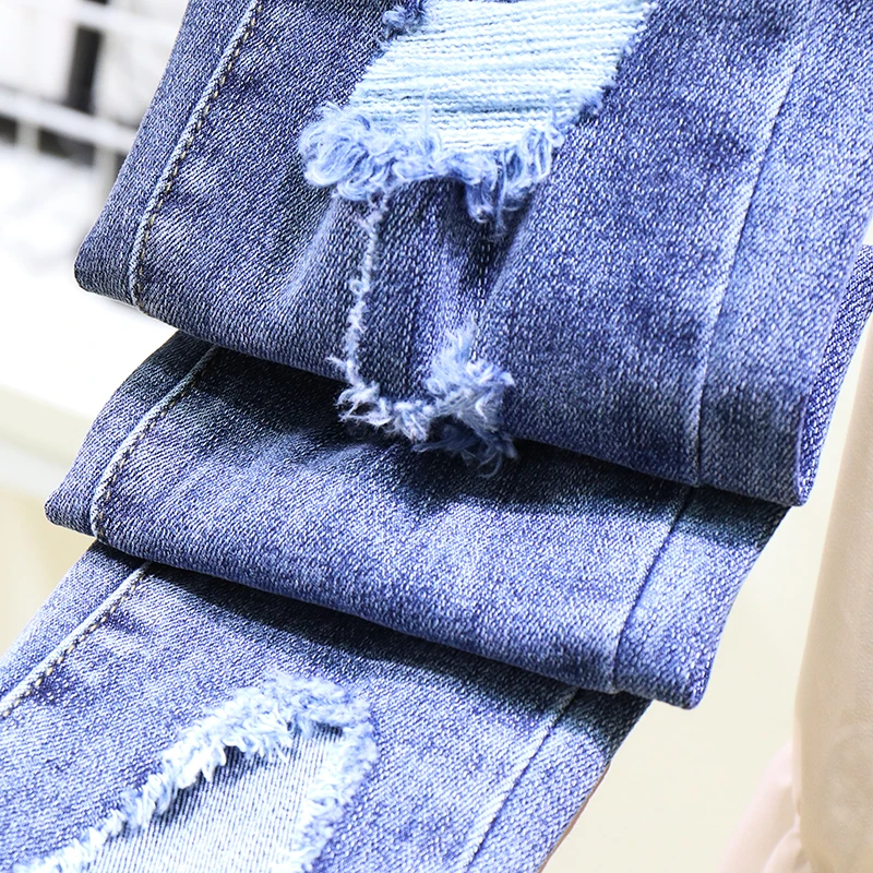 

2021 Spring and Summer Jeans New Blue Color Chic Ripped Split Denim Jeans Women's Cropped Pants Stretch Skinny Tappered Pants