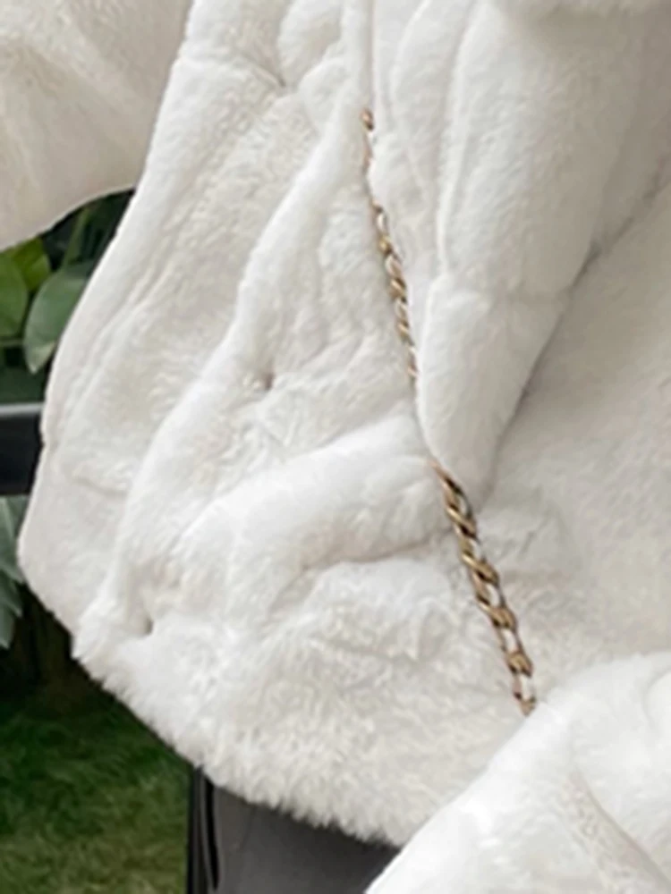 

Lautaro Winter Short White Warm Faux Fur Coat Women Long Sleeve Pockets Fluffy Jackets for Women 2021 Fashion Korean Clothes