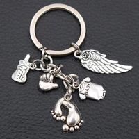 cute baby metal memorial keychain tiny footprint charms tiny palms charms angel wings pendantmini baby bottle charms 1pcs