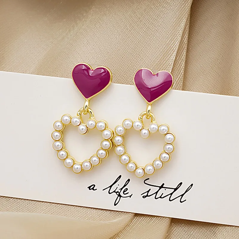 

Women Temperament Hollow Love Pearl Earrings New Fashion Silver Needle Sweet Wild Small Retro Peach Heart