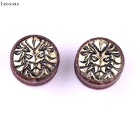 leosoxs european and american hot sale lion head wood ear expansion wood ear pin earrings piercing jewelry new products