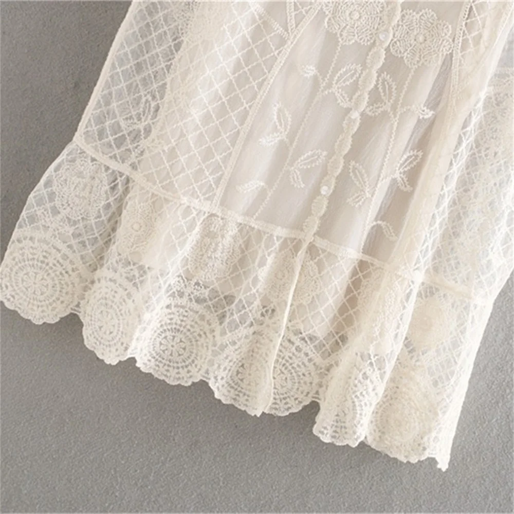 

2020 summer women's new V-neck short-sleeved French embroidery stitching mesh yarn bud ribbon lining loose mini dress