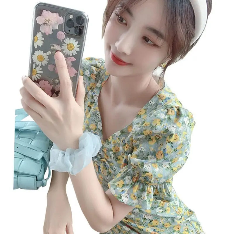 

2021 new summer little fairy tea break oil painting style puff sleeve skirt v-neck waist small daisy floral dress female