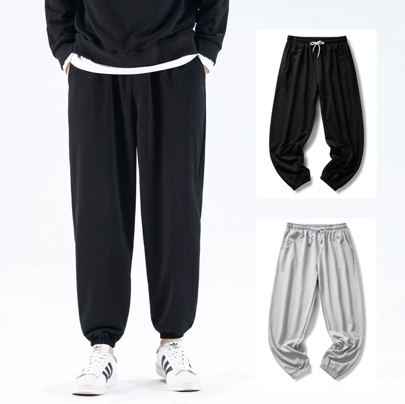 

2021 Men's casual pants fitness sportswear men large size solid color sports pants male troausers black gym jogging sports pants