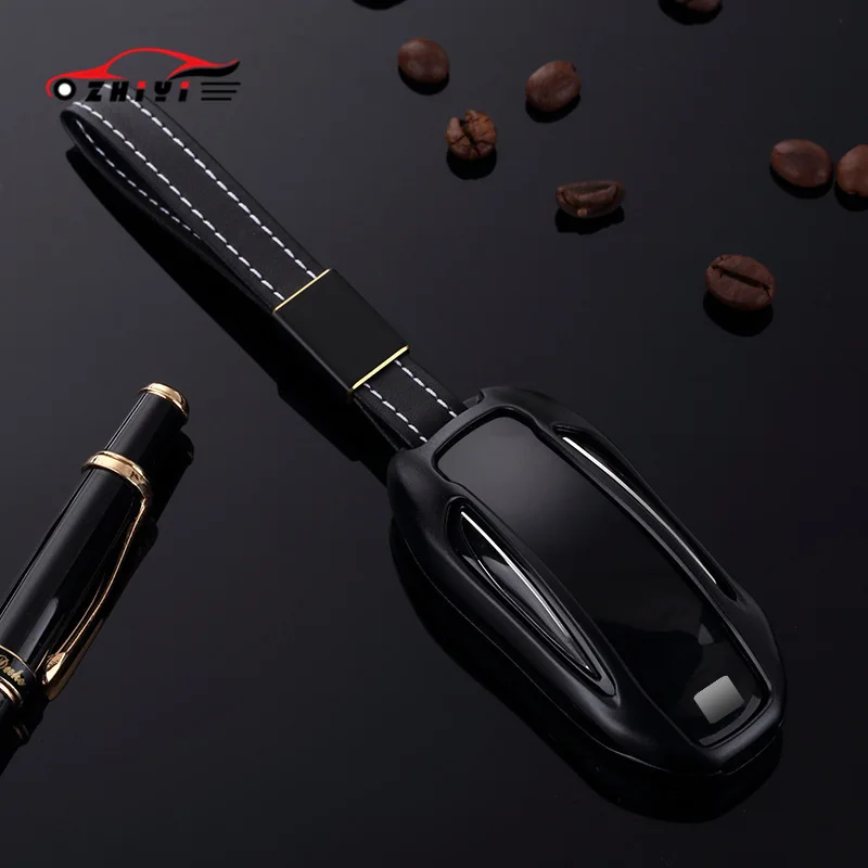 

Car key case is suitable for Tesla model x key case key chain buckle aluminum alloy is a special jewelry car accessories