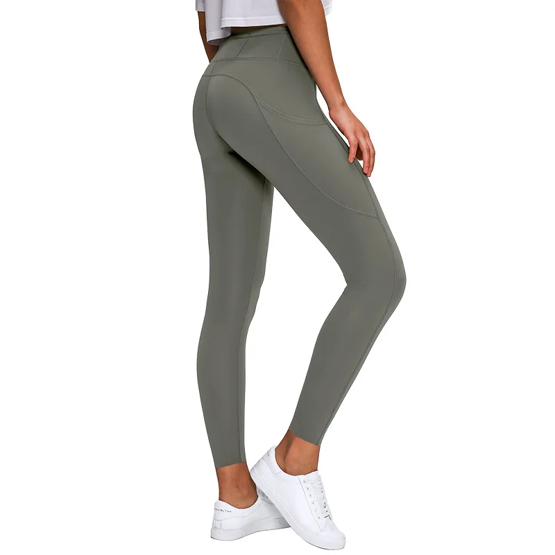 

New stretch double-sided thin yoga pants women's high waist stitching pocket sports running nine minutes pants