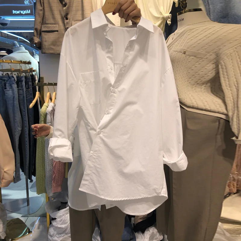 

Korean women's new Korean 2021 spring irregular asymmetric Shirt Top niche design