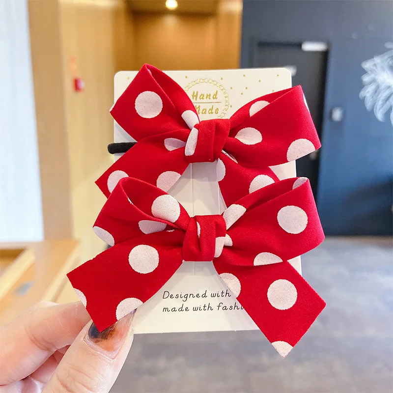 

Red bow hair rope sweet love polka dot girl hair circle double ponytail simple and versatile