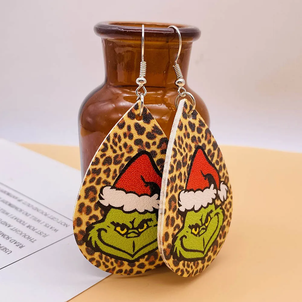 

Новинка, серьги из искусственной кожи Grinch, рождественские Мультяшные серьги-капли с узором Санты для женщин, подарки, ювелирные изделия, акс...