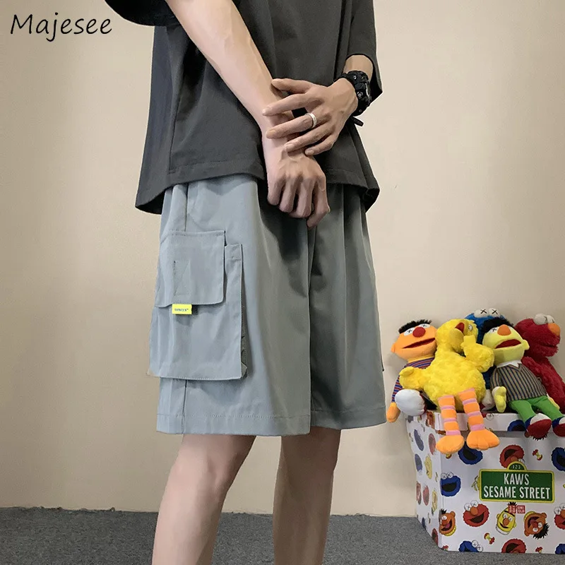 

Men Casual Shorts Summer Loose Breathable Cargo Knee Length Trousers Harajuku Pockets Solid Fashion All-match High Street Trendy