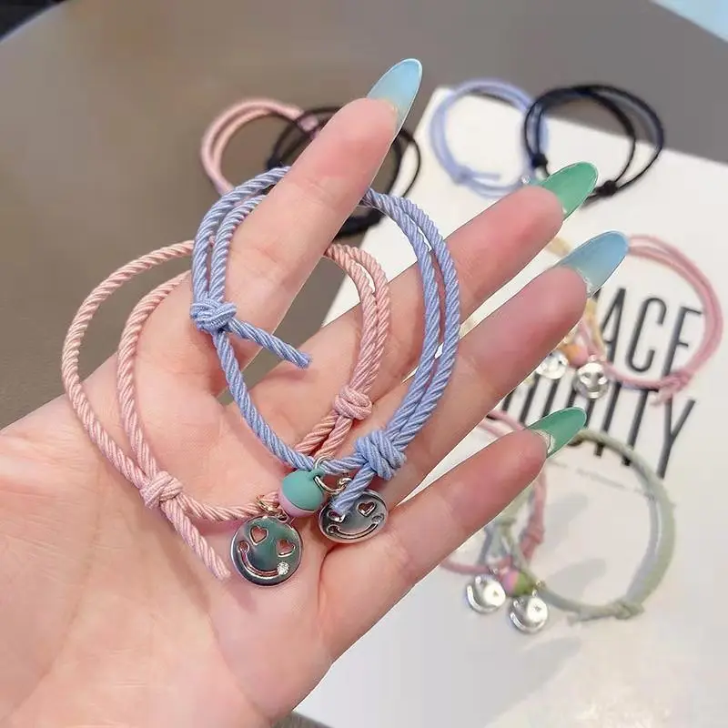 

WonderlifeIron absorption for male and female couples students small rubber band smiling face bracelet female ins sensing