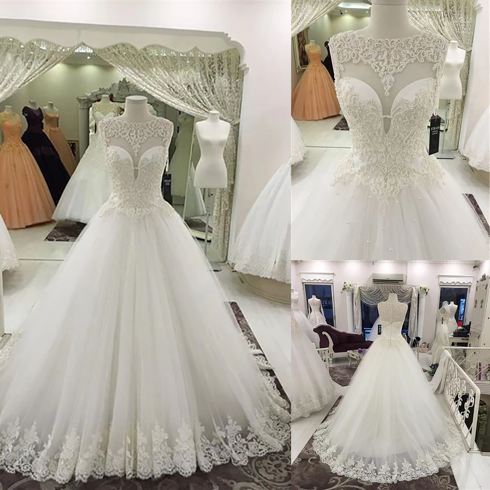 

С О-образным вырезом заказ великолепный ТРАПЕЦИЕВИДНОЕ Тюлевое Платье Иллюзия Свадебные платья белого цвета на пуговицах без рукавов с нат...