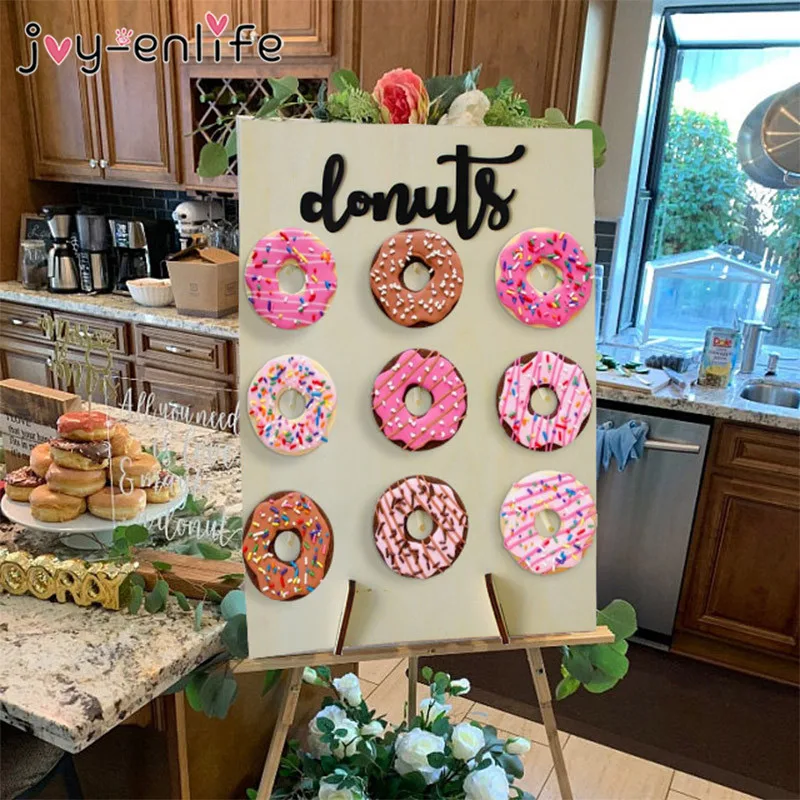 Деревянный пончик стены вмещает стенд свадебное украшение невесты