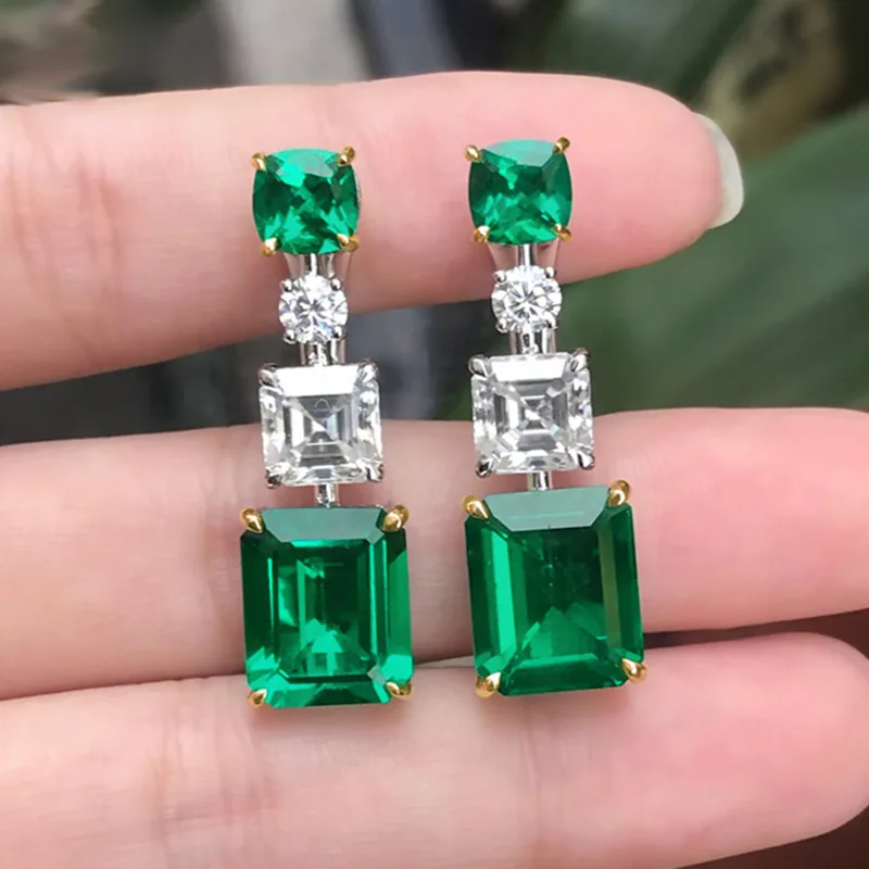 

Серьги-подвески женские из 18-каратного белого золота с зеленым камнем