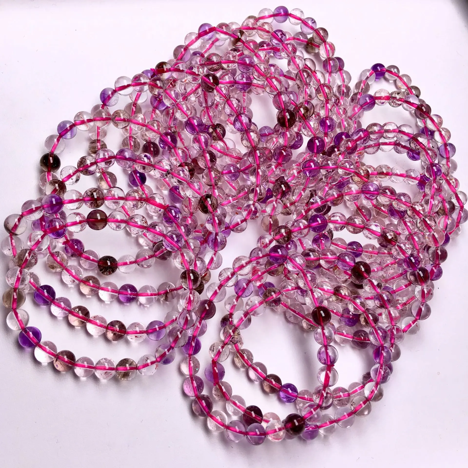 

Hongshi Zhai Natural Crystal Hair Crystal Bracelet Exceed Seven Backbone Round Crystal Bracelet Chakras Ice Penetrating Body