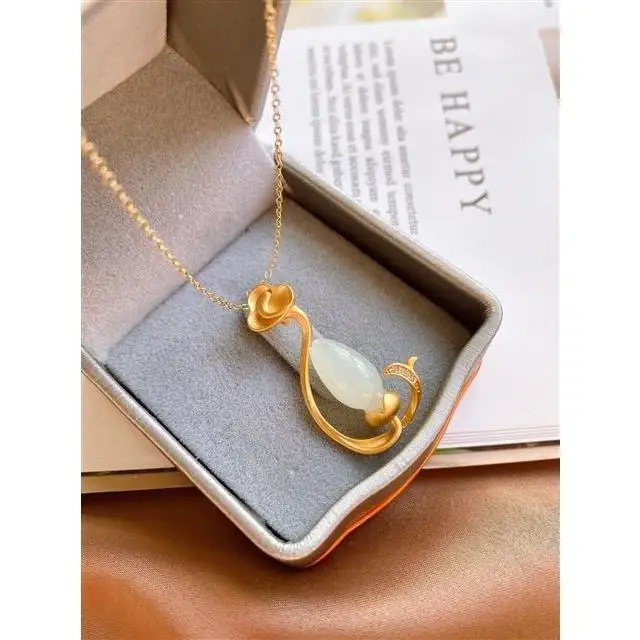 

Ruyi Magnolia Pendant S925 Sterling Silver Natural Hetian Jade Silver Inlaid Gilding Craft Exquisite Workmanship