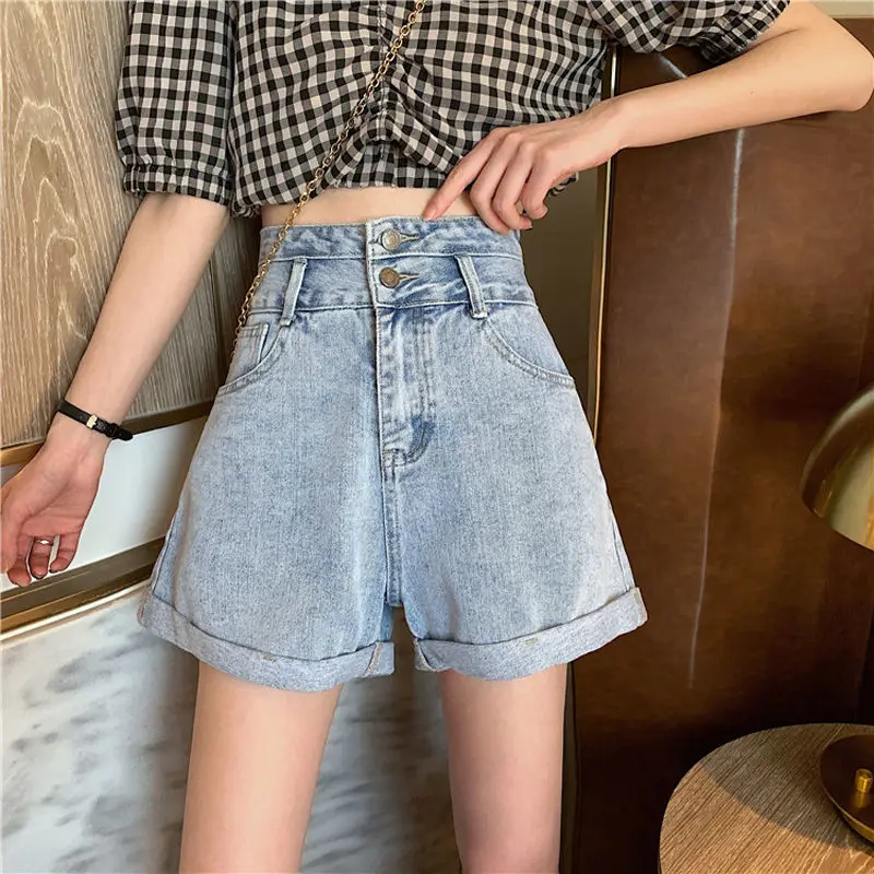 

Summer Korean version ins design feeling loose and thin flanging wide leg hot pants student high waist straight tube denim
