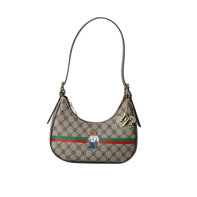 

Messenger bag female All-match retro armpit bag baguette bag female spring new bear shoulder