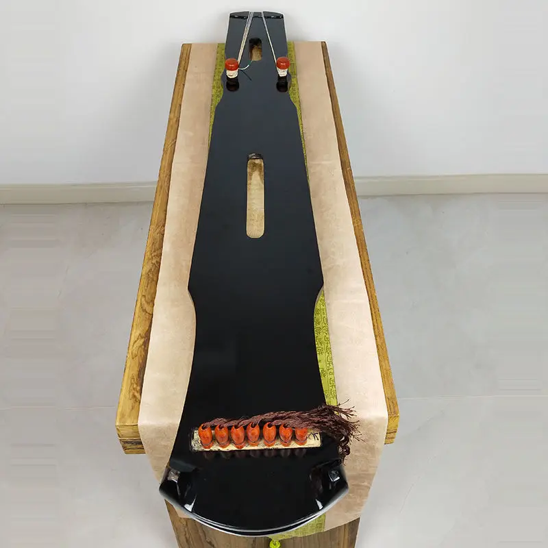 Цена Традиционные деревянные музыкальные инструменты ручной работы Guzheng Sycamore 7 струн для сцены для начинающих цитра Pаспродажа Традиционные деревянные музыкальные инструменты ручной работы Guzheng Sycamore 7 струн для сцены для начинающих цитра