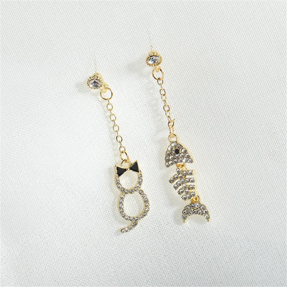

NEW Fashion Fishbone Stud Earrings Women Long Asymmetry Of Cat Earrings Accessories