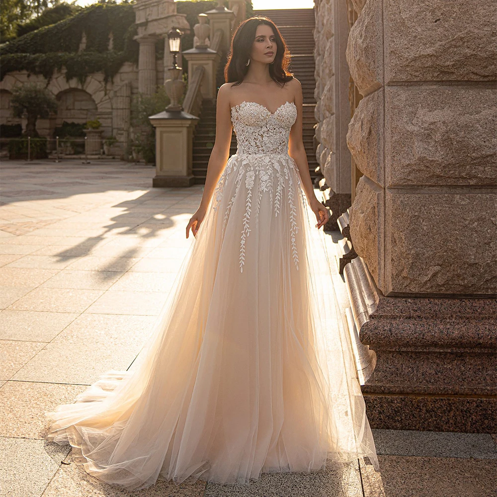 

Sexy A Line Wedding Dresses Champagne Sweetheart Sleeveless Beading Appliques Tulle Sweep Train Robe Mariage Bridal Gowns
