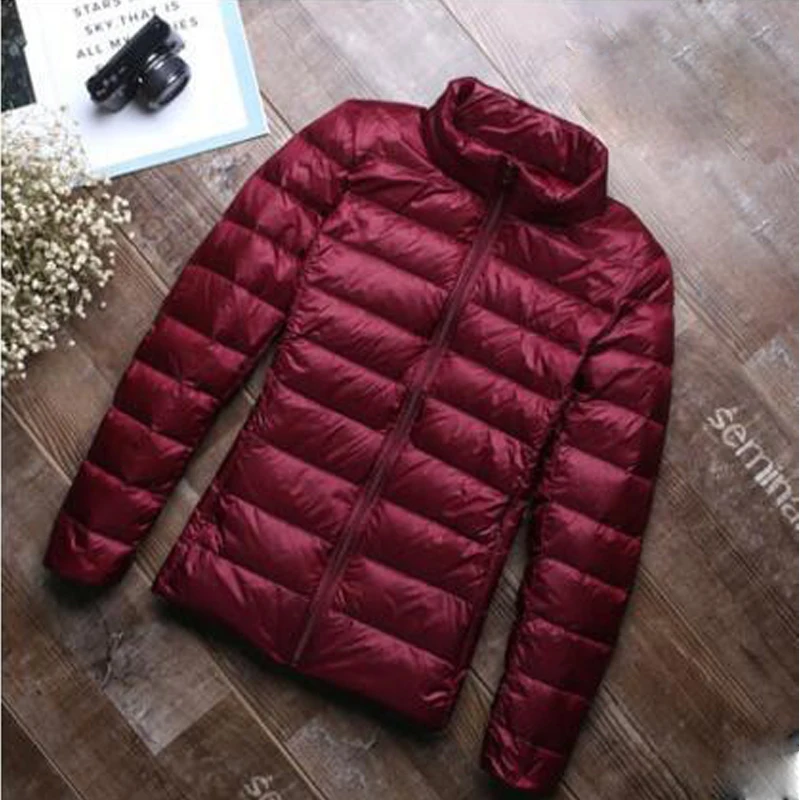 Женская куртка на белом утином пуху осенне зимняя облегающая теплая Сверхлегкий