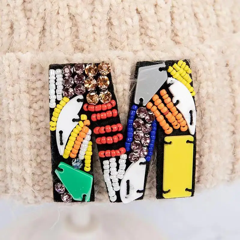 

Child baby fashion Autumn Winter Thicken Warm Knit hat Cartoon letter Skull pompom Double layer Beanie Hairball cap Z159