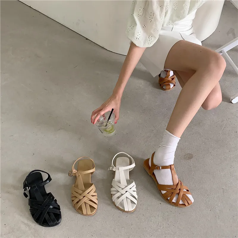 

Fashion sandals 2021 new female flat-bottomed Roman sandals word casual sandals tide beach shoes