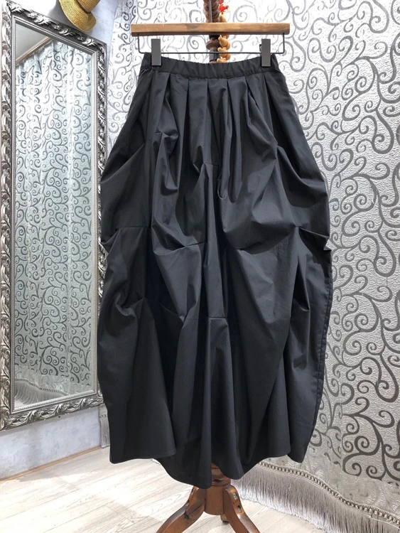 

2021 spring and summer new women's elastic waist solid color decoration micro Peng versatile sweet mid length skirt 325