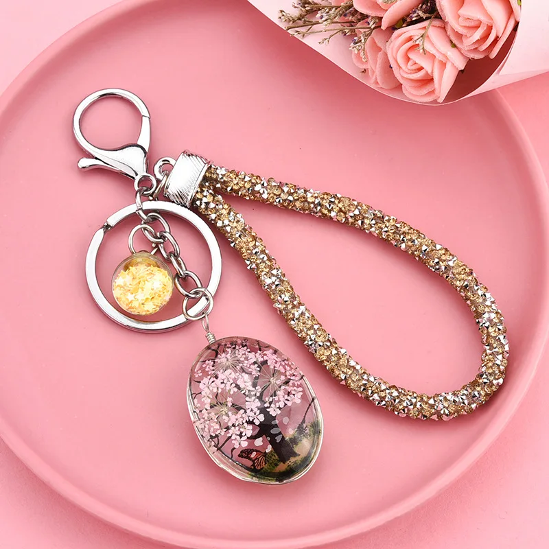 

Best selling creative starry dried flower plant butterfly keychain bag accessories time gem handmade glass car key ring