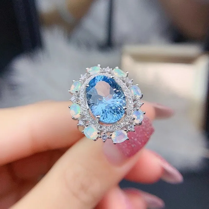 Кольцо из серебра 100% пробы с натуральным голубым топазом опалом