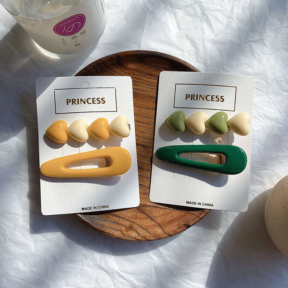 

Новинка, комплект одежды из 2 предметов, модный пластиковый геометрический принт заколки для волос для женщин с повязкой на голову для девоч...