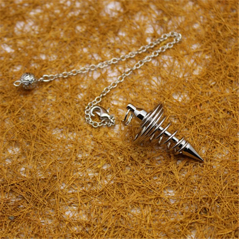 Старинный медный конический молоток в серебряных и золотых подвесках молотках