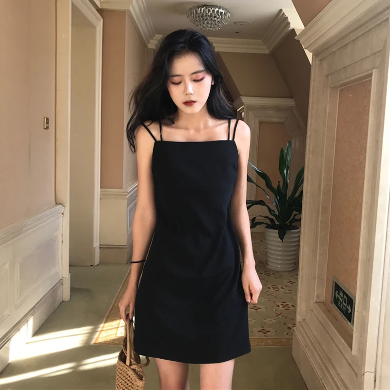 

Spring and autumn Korean version 2021 new chic slim sexy show clavicle buttocks small black dress suspender dress Sexy skirt