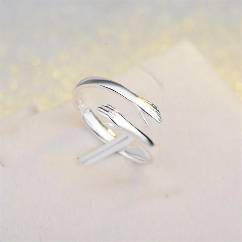 

Hot New 925 Sterling Silver European and American Jewelry Love Hug Rings Female Retro Fashion Trend Couple Opening Ring Gift