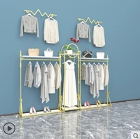 european top grade womens clothing store rack display rack floor type clothing store shelf display shelf gold