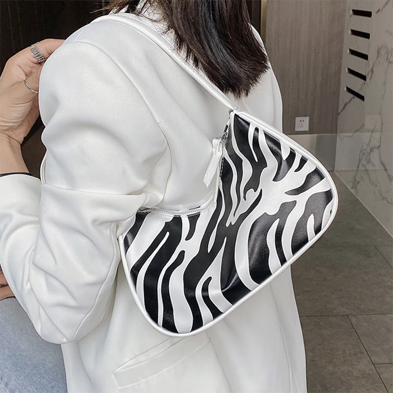

S.IKRR Cow Print Small PU Leather Crossbody Bags For Women 2020 Elegant Baguette Bag Shoulder Handbags Female Travel Hand Bag
