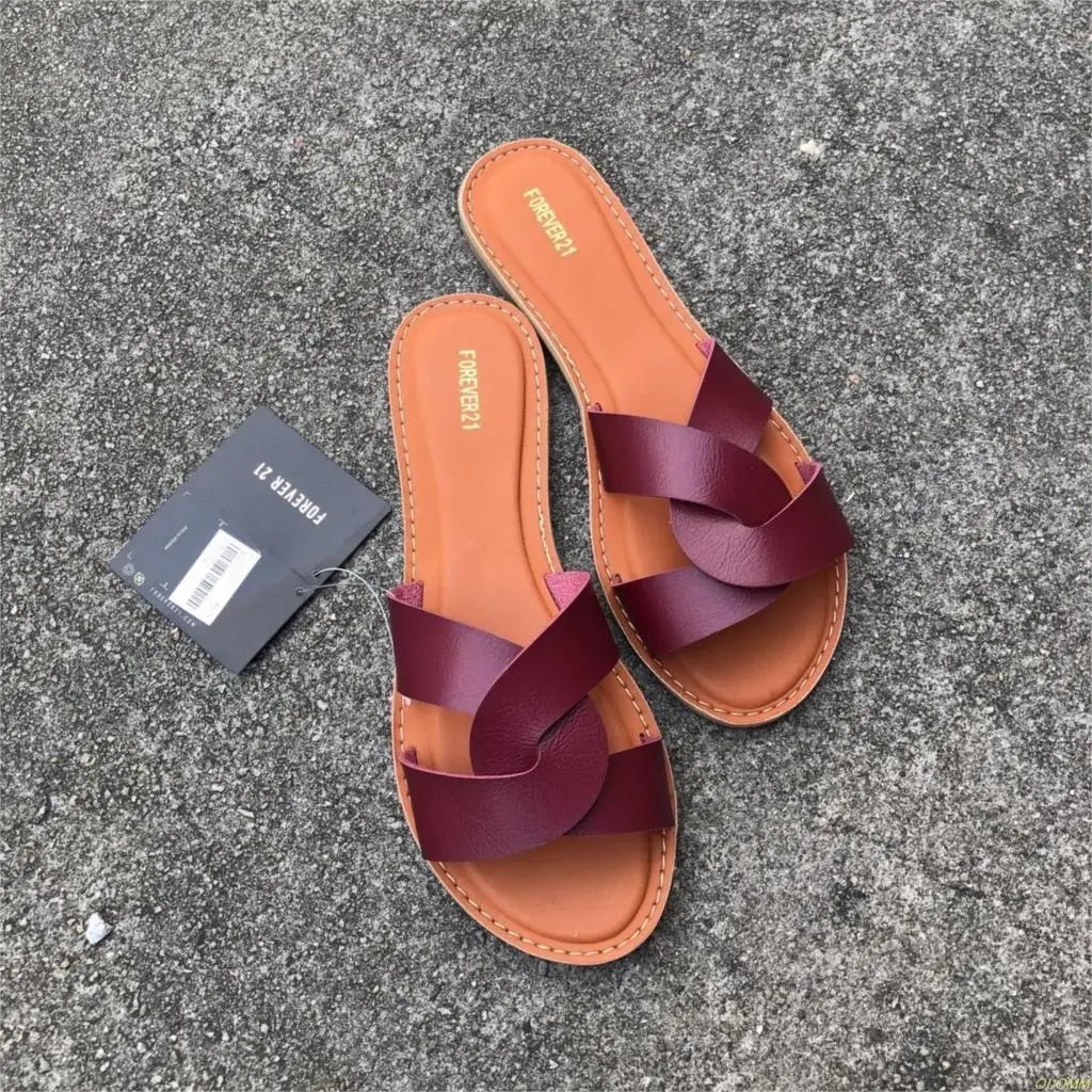 

Factory direct 2020 new women's leather solid color two-layer leather flat bottom beach seaside holiday fashion slippers