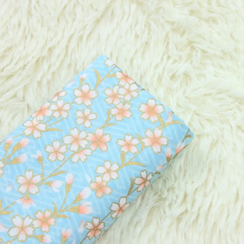 Импортная ткань из чистого хлопка с мягким бризом цветущей вишни позолоченная