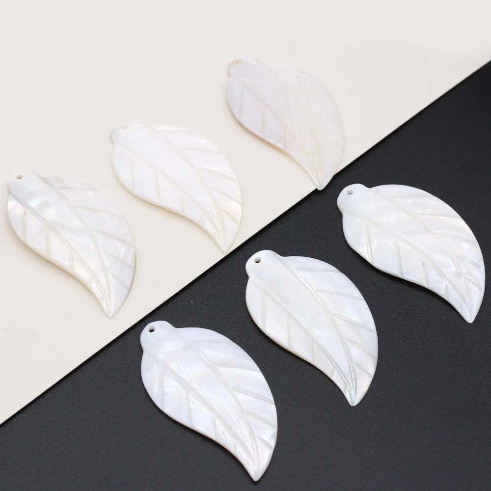 

Wholesale Hot Sale Freshwater Leaf shape Shell Pendant Beads Jewelry Fashion Carving Handmade DIY Necklace Earrings Making
