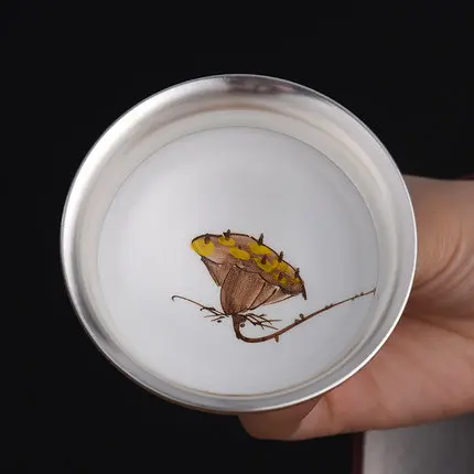 Керамическая чайная чашка ручной работы с внутренним покрытием из серебра 999