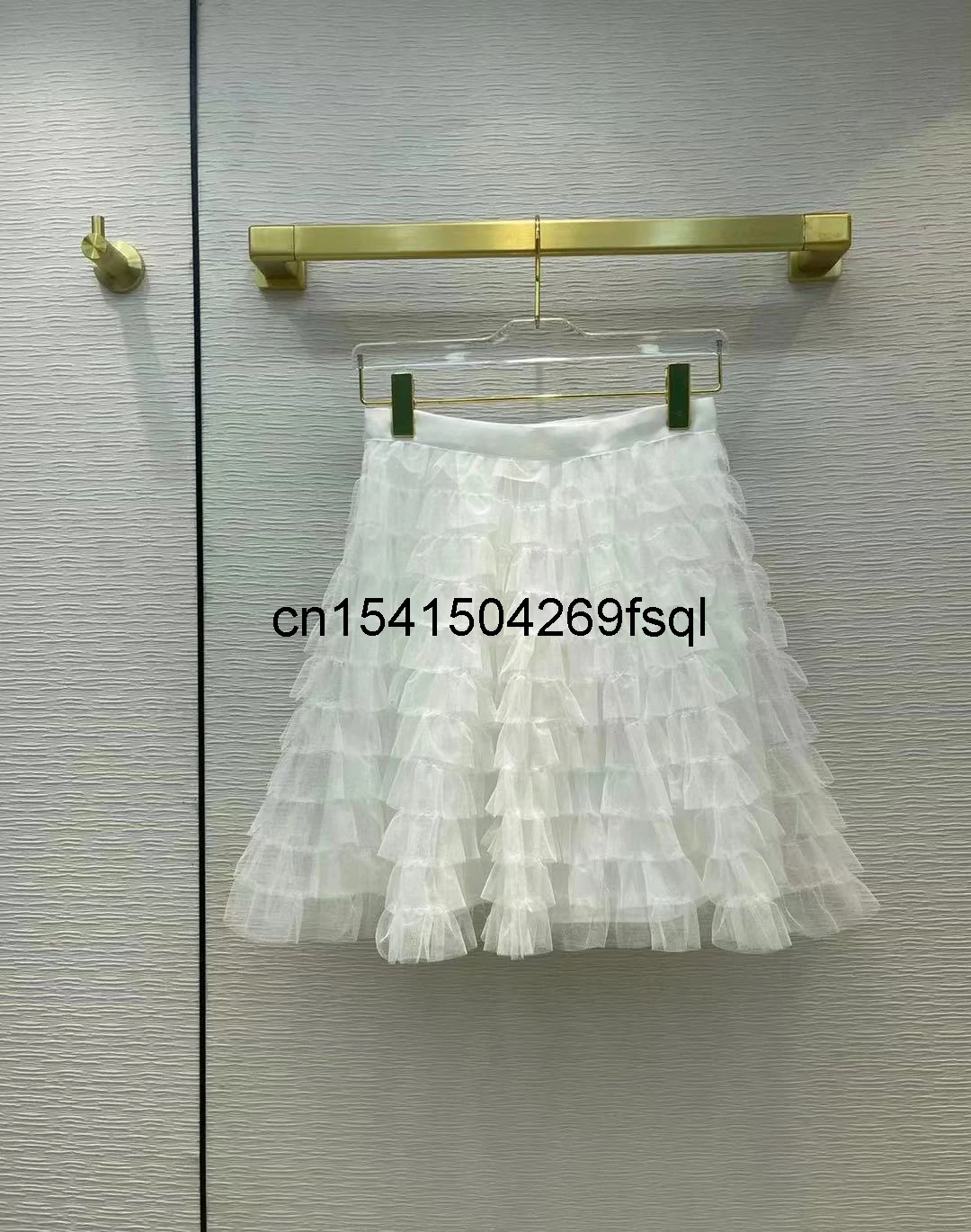 

New Sexy Mini Mesh Skirt High Waisted Runway Ladies Sweet White / Black / Dark Blue Skirts Women 2021 Summer New Fashion