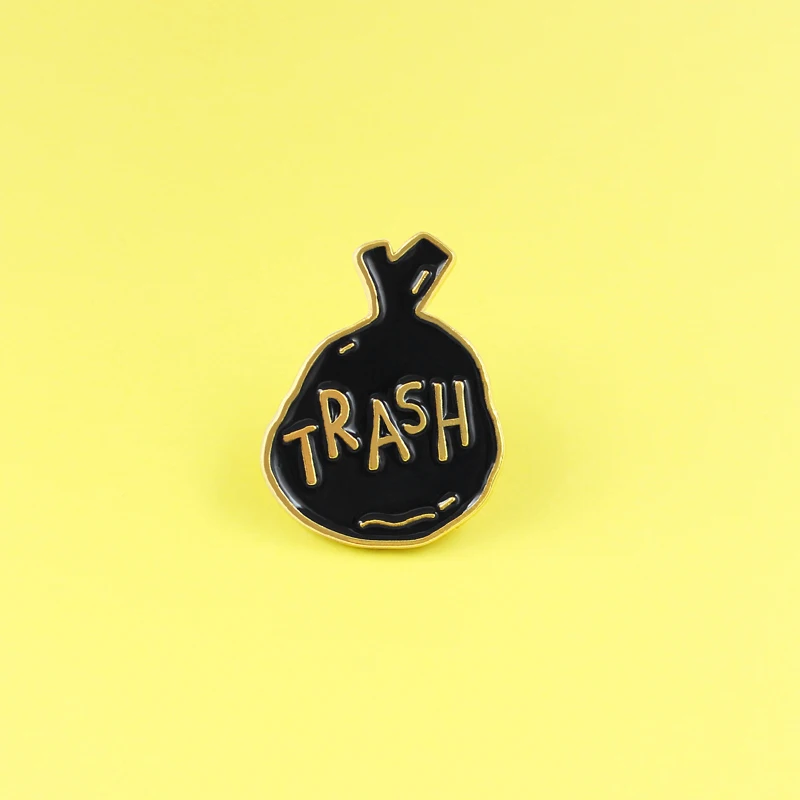 Черная эмалированная брошь в форме мешка для хранения мусорного пакета с