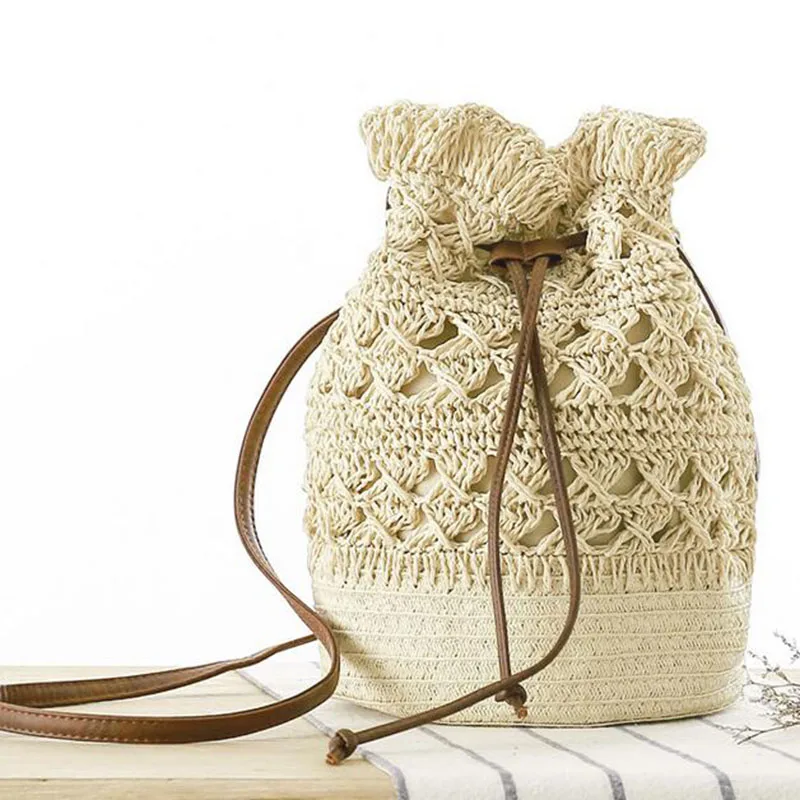 

Соломенное ведро, новая женская сумка, ажурная сумка через плечо для отпуска, плетеная пляжная кожаная плетеная дизайнерская женская сумка ...