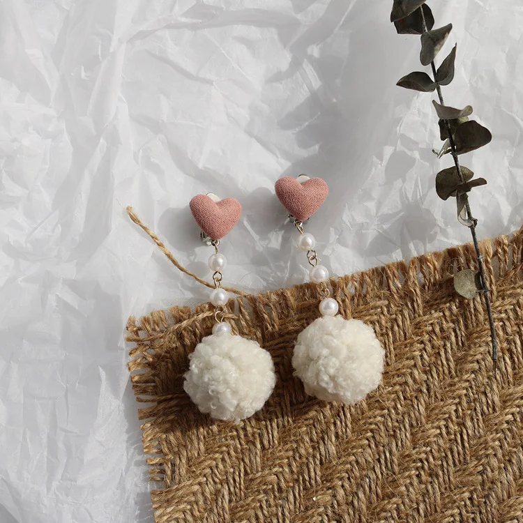 

New earrings girl love deerskin earrings long wool ball plush pearl earrings female earrings fashion earrings dangle earrings