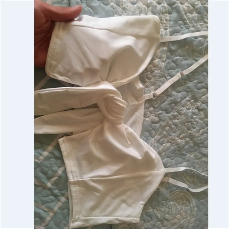 Женский укороченный топ с бантом v-образным вырезом и открытой спиной без рукавов