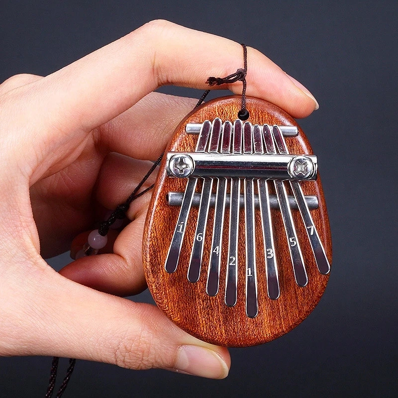 

2pcs Portable 8 Keys Mini Kalimba Thumb Piano Beginners Finger Keyboard Pendant Solid Wood Crystal Transparent Five-finger Piano
